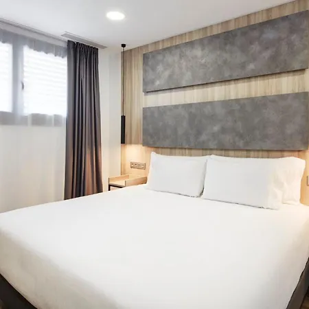 Sercotel Delicias Отель